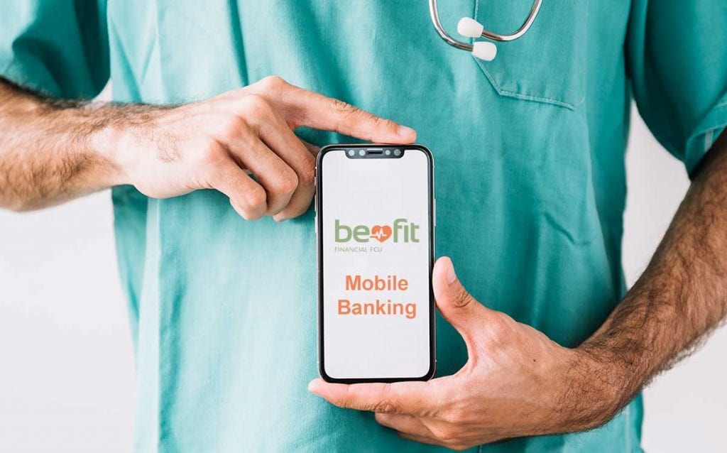 Doctor holding cell phone with Befit logo