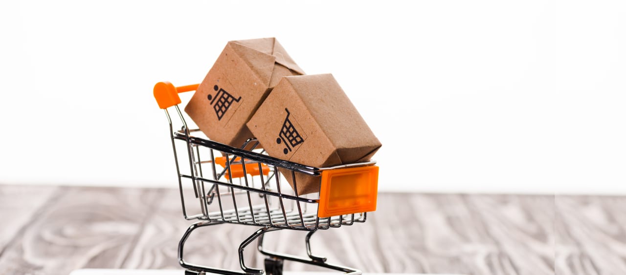 shopping cart filled with boxes