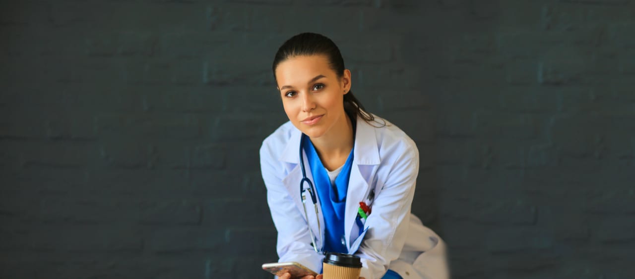 woman doctor leaning forward